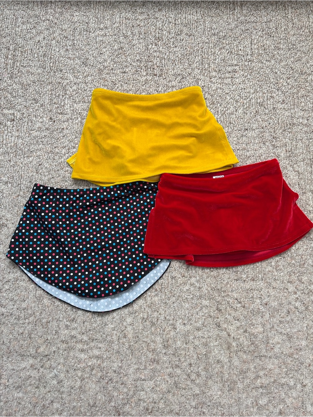 Lot of figure skating skirts size 6-8Y